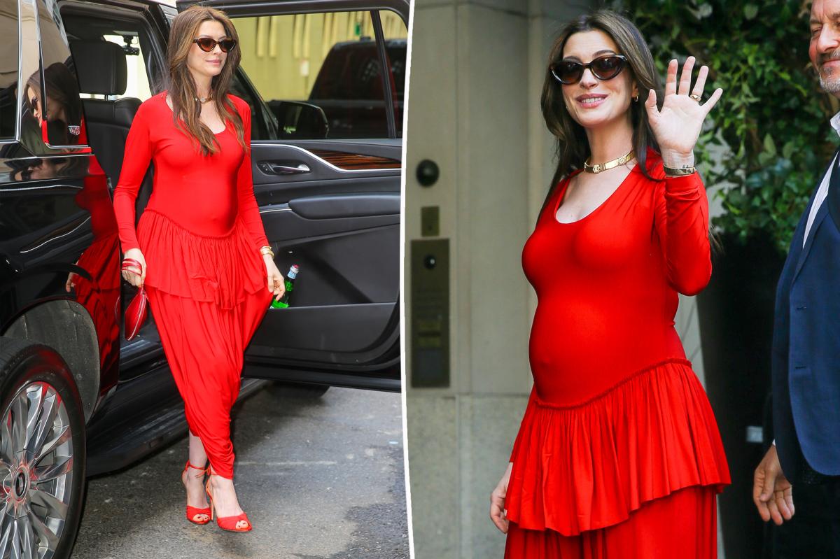 Anne Hathaway Showcases Baby Bump in Red Jumpsuit for 'The Odyssey' Press Tour